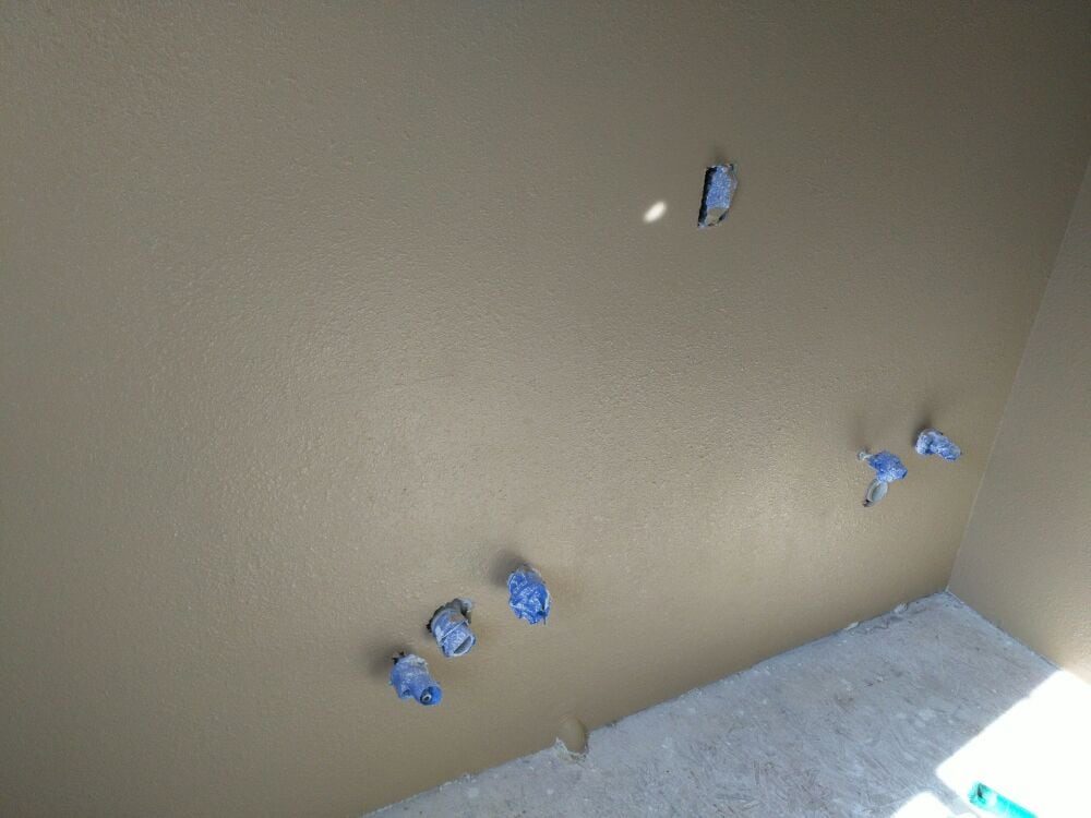 Finished wall, textured and painted to match