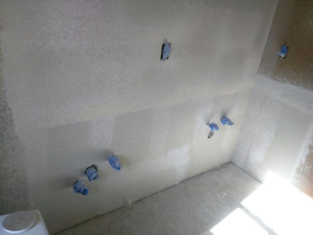 Drywall patched and texture matched, not yet painted