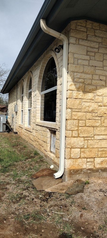 Rain gutter downspout after the repair