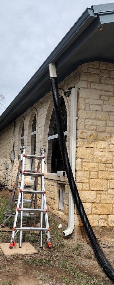 Rain gutter downspout before the repair
