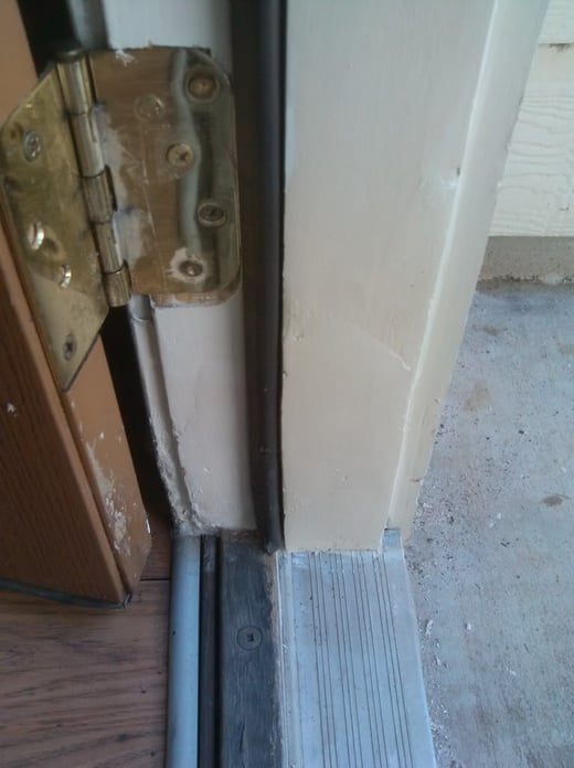 Rotted door frame and threshold after the repair